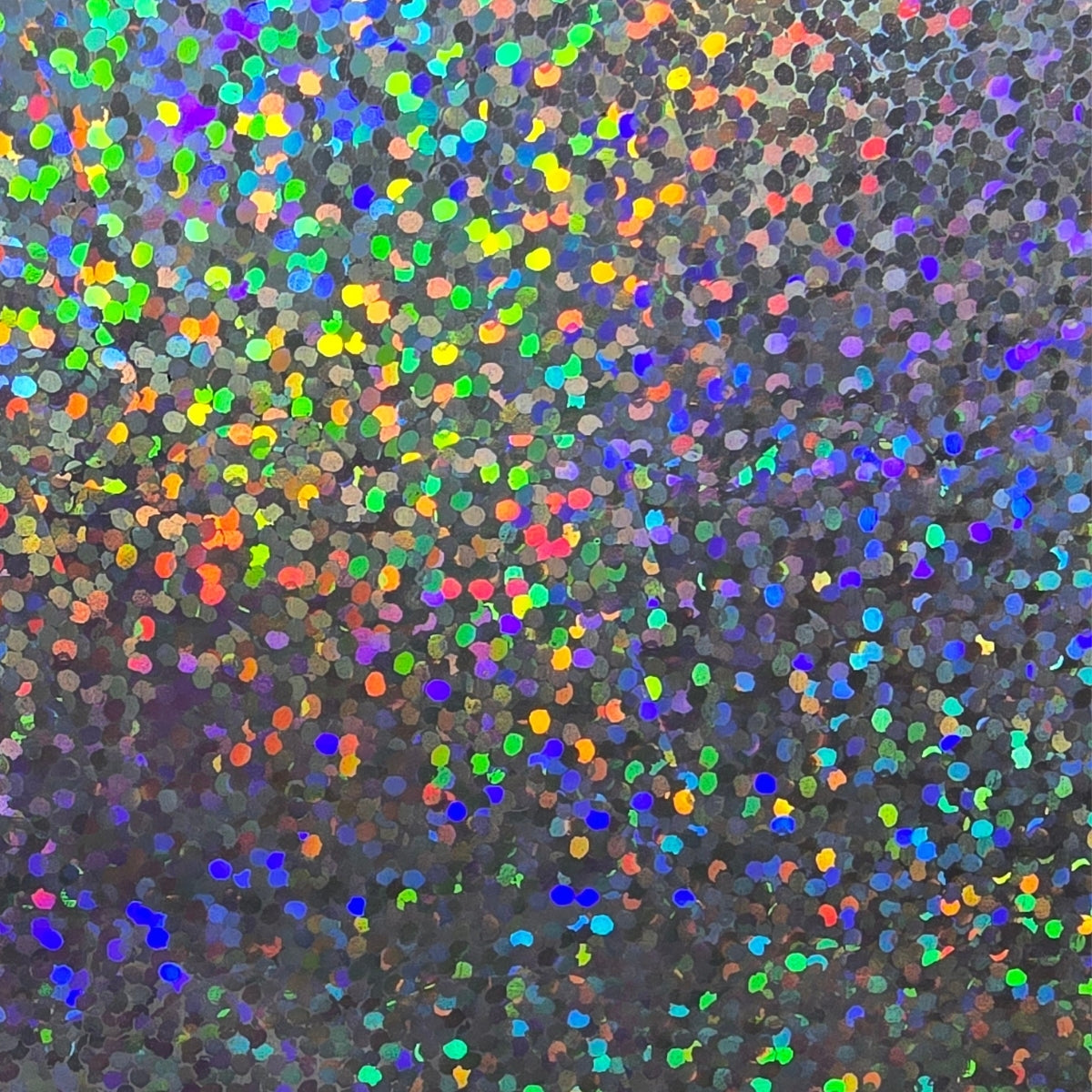Glitter holographic vinyl with a rainbow spectrum effect and a smooth, light-reflecting dot pattern texture.
