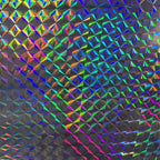 Prismatic holographic vinyl with a geometric diamond pattern reflecting iridescent rainbow colors.