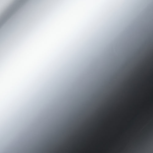 A close-up of a smooth metallic surface with a silver-to-gray gradient and soft reflective highlights.